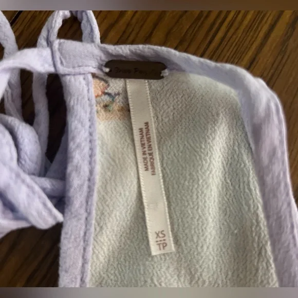 Free People 
XS
White Lavender 
Floral Tank
EUC - Picture 7 of 8